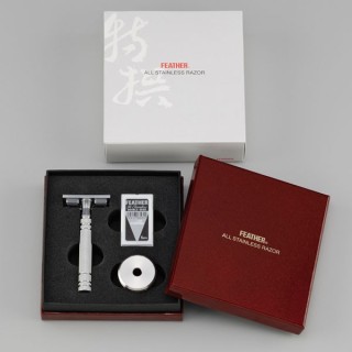 Maquinilla Feather "Luxury" Acero Inoxidable. Estuche regalo con stand.